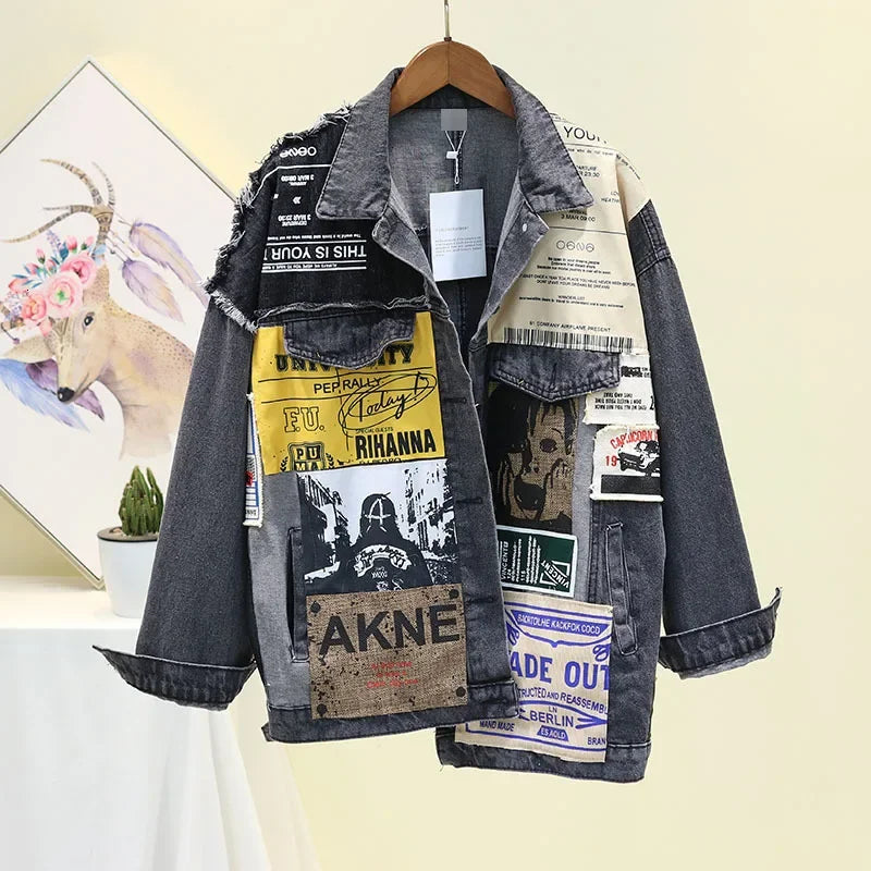 A stylish vintage denim jacket with colorful graphic patches, perfect for a bold and unique fashion statement.