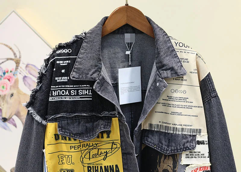 A stylish vintage denim jacket with colorful graphic patches, perfect for a bold and unique fashion statement.