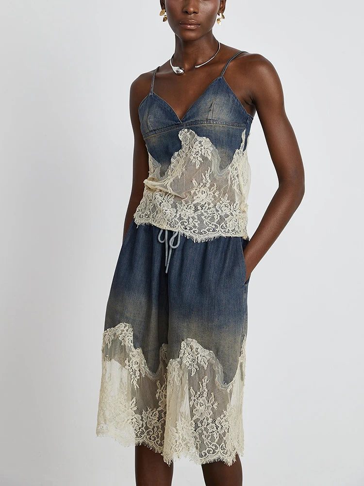 Stylish two-piece denim set for women with lace accents, featuring a denim camisole and matching shorts. Perfect for casual and chic occasions.